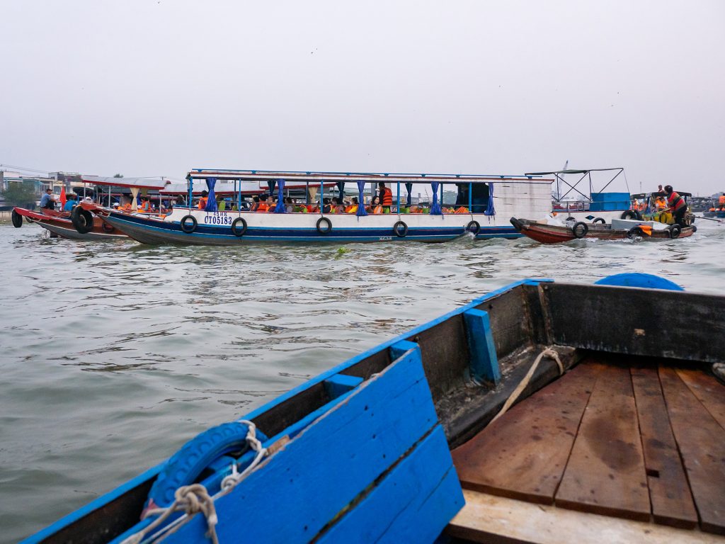 Tourist boats at Cai Rang floating market.